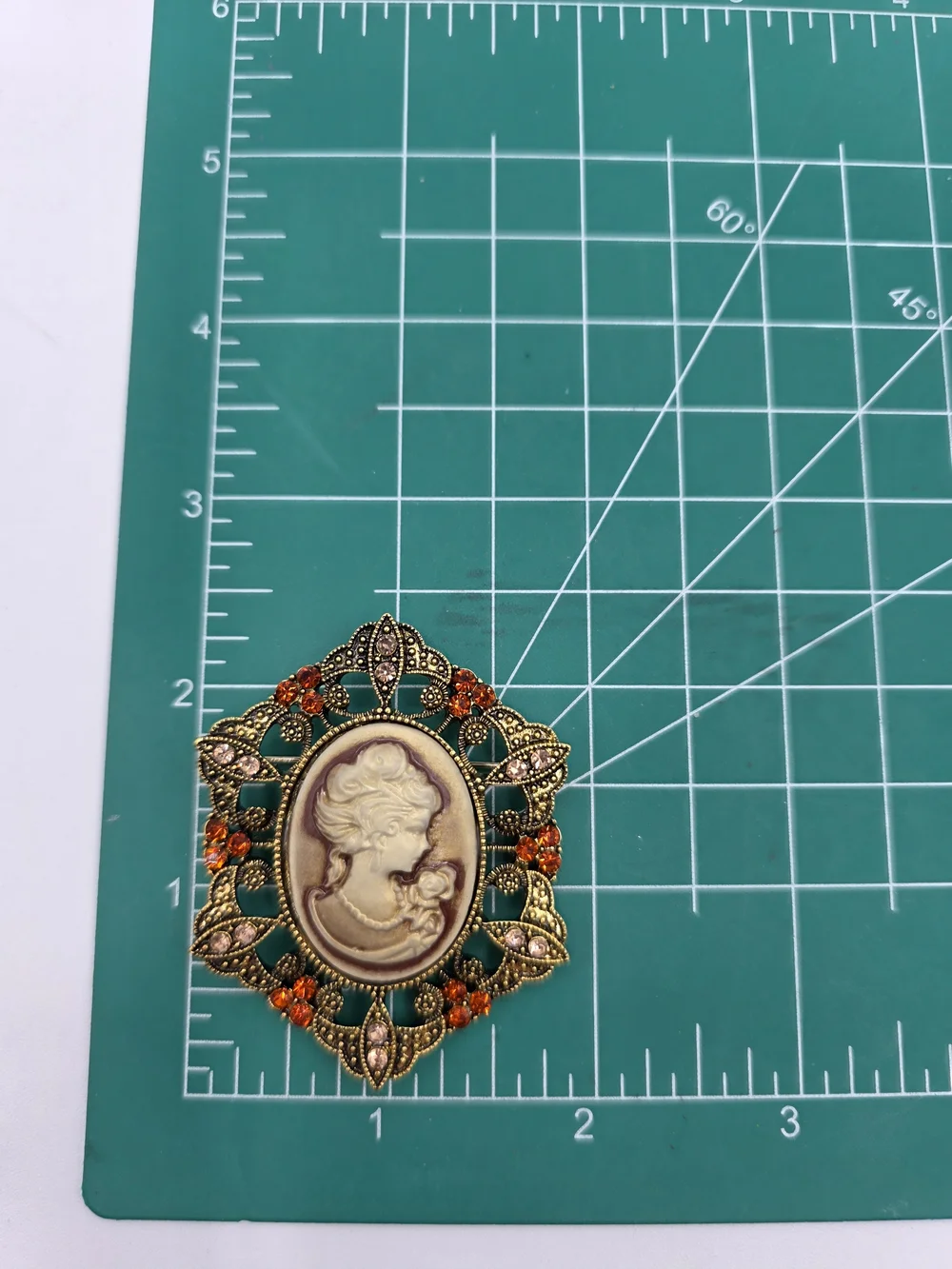 Vintage Style Cameo Brooch with Gold Filigree and Amber Crystal Accents